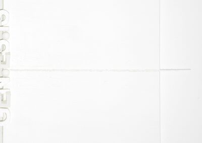 Detail of the horizontal salt line extending across the ultra-matte white canvas and projecting beyond the frame, symbolizing the outward consequence of a focused thought in PAGE ZERO.