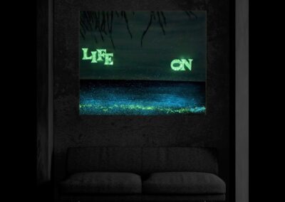 LIFE ON by K-NY — photoluminescent conceptual artwork activated in darkness, dual-spectrum composition revealing structural light within spatial context