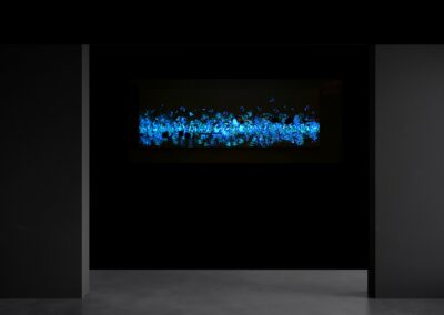 NEW PER by K-NY — photoluminescent conceptual artwork activated in darkness, dual-spectrum composition revealing structural light within spatial context