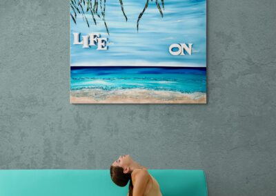 LIFE ON by K-NY — photoluminescent conceptual artwork in spatial context, dual-spectrum composition interacting with light and architecture