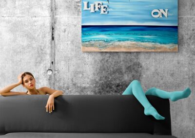 LIFE ON by K-NY — photoluminescent conceptual artwork in spatial context, dual-spectrum composition interacting with light and architecture