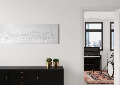 THE RED THREAD by K-NY in interior space — large-scale monochrome mixed-media work with white linear structure creating psychological tension, orientation, and spatial calm.
